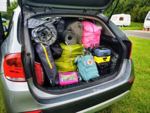 car boot open packed for camping trip