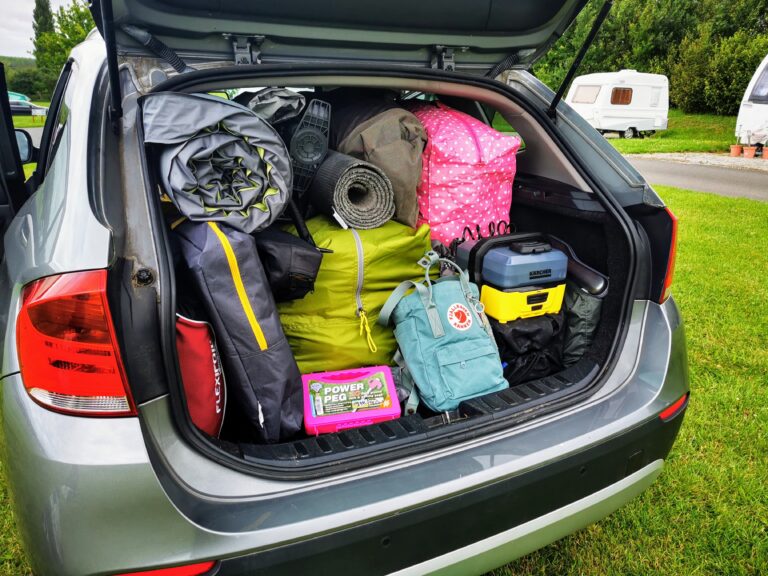 car boot open packed for camping trip